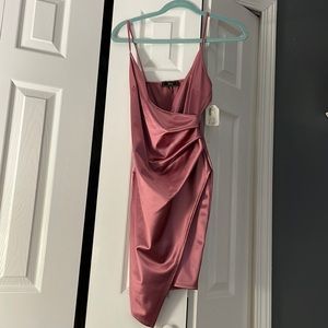 Bought this Dress for New Years Eve but never wore it. BRAND NEW WITH TAG!